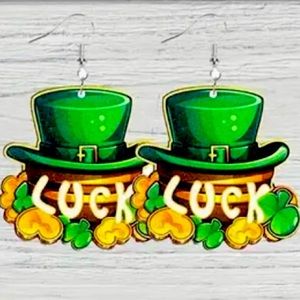 Leprechaun hat earrings carved in a wooden surface. Lightweight and comfortable.